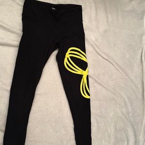 TNA leggings with TNA logo